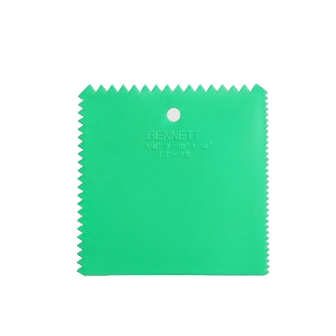 Multipurpose trowel with notches
