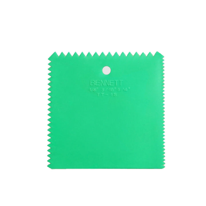 Multipurpose trowel with notches